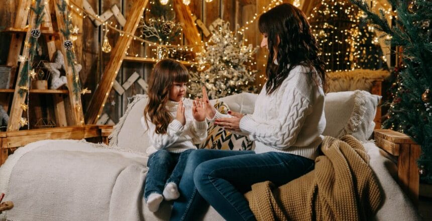 a-little-girl-with-her-mother-in-white-sweaters-in-2023-11-27-05-26-53-utc