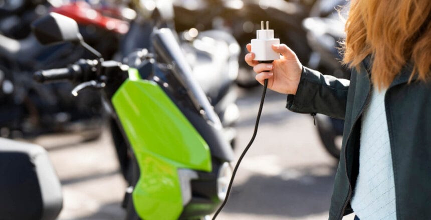How to charge an electric motorcycle in a city parking lot